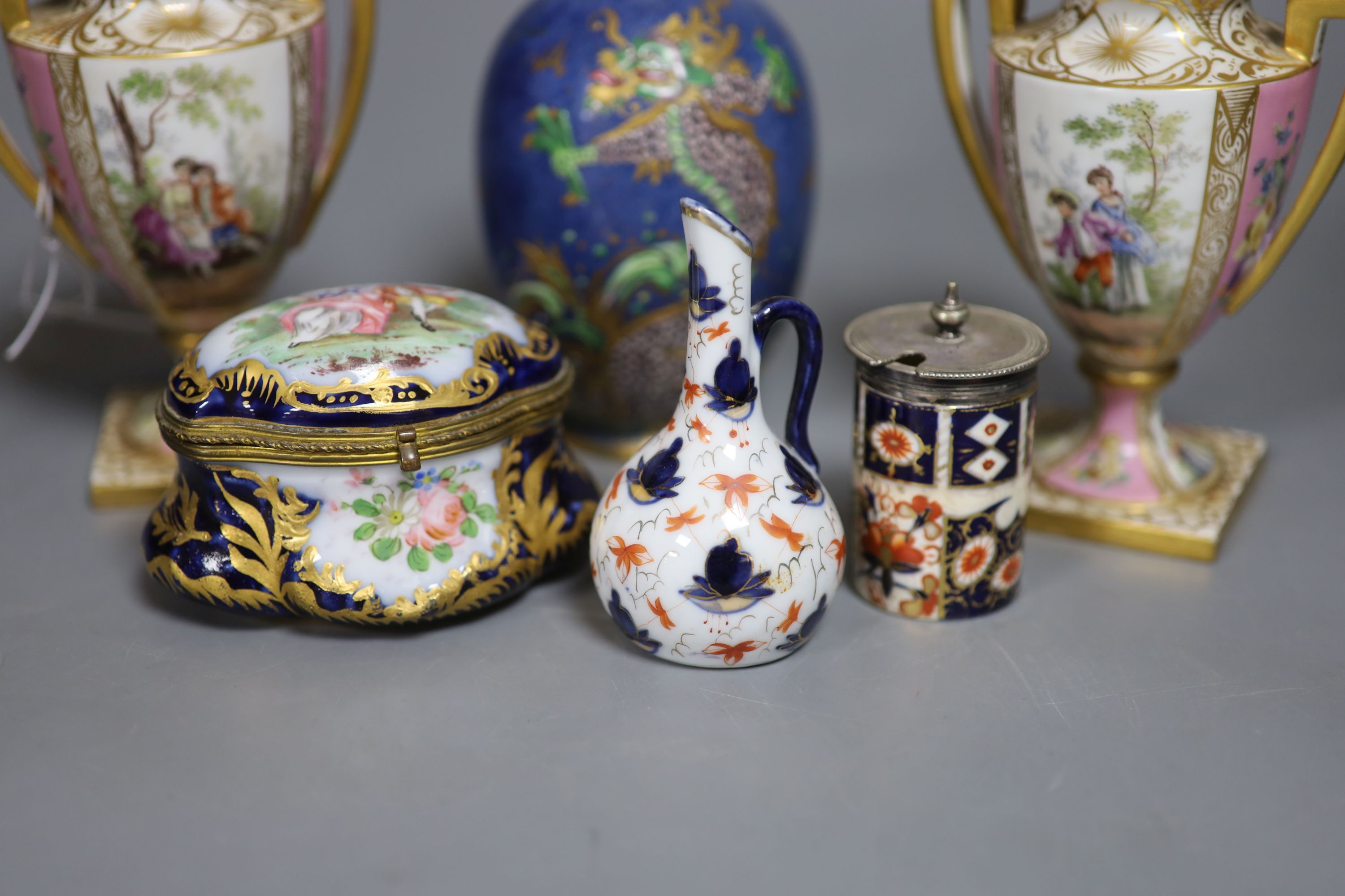 A pair of Austrian porcelain vases, Sevres style casket etc